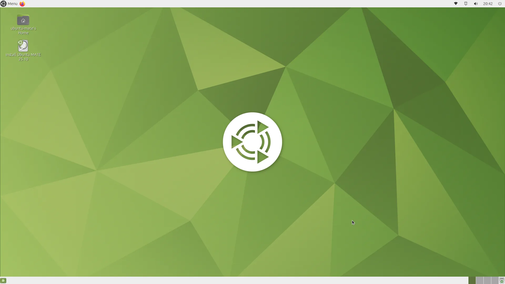 Ubuntu MATE desktop with green wallpaper, desktop shortcuts and panels along the top and bottom.